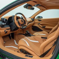 the interior of a green sports car