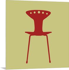 a red chair sitting on top of a yellow wall