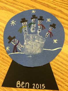 a paper plate with snowmen on it