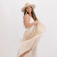 The sarong is the best accessory for your days at the pool or beach. And takes up zero room in your suitcase when you're packing for your beach vacation! Breezy, comfortable, and versatile our Ivory Coast Sarong can be worn tied around the waist or even tied around the neck as a dress. Block Printing is one of the oldest types of printmaking, and has been around for thousands of years. Our Block Printed Sarongs have bright bold prints and are stamped onto a super soft cotton. Perfect for an easy Breezy Wrap Cover-up For Vacation, White Wrap Swimwear For Beach Season, Beach Vacation Wrap Sarong, Beach Season Vacation Wrap Sarong, Beach-style Wrap Sarong, Beachy Wrap Sarong For Beach, Summer Wrap Sarong For Beach Party, Summer Wrap Sarong For Vacation, Beachy Wrap Cover-up For Poolside