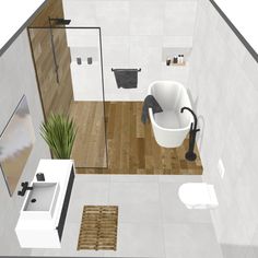 an aerial view of a bathroom with wood flooring