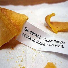 a piece of food that is on top of a napkin with a note saying be patient, good things come to those who wait