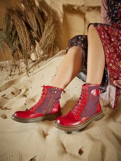 Created to make a splash, Soffia's Hot Stepper Leather Combat Boots will be sure to raise a few eyebrows - perfect for showing your flair for the daring and unique. These fiery red boots feature supple leather uppers with all the classic combat boot details. Take the streets in style! 1'' heel 9.2 shaft 11.5 circumference Zip / lace-up closure Genuine leather upper Leather / Textile lining Leather footbed Leather midsole Leather insole Rubber sole Leather Combat Boots, Reindeer Headband, Red Boots, Combat Boot, Fiery Red, Daily Dress, Dress Jewelry, Trendy Shoes, The Streets