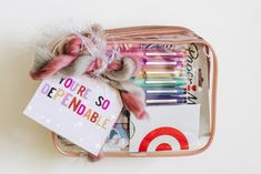 an open suitcase filled with personal care items