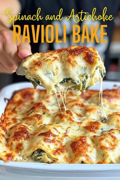 spinach and artichoke ravioli bake is being lifted from a casserole dish