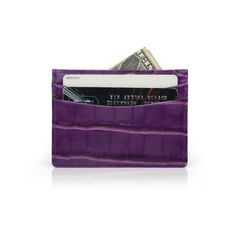 Elevate your style with this luxury leather card holder, crafted from premium Italian cow leather with a sophisticated crocodile pattern. The rich dark magenta color adds a touch of elegance. Specifications: • Material: Italian cow leather with crocodile pattern• Color: Dark Magenta• Size: 10 x 7.3 cm (3.94 x 2.87 inches)• Structure: 4 credit card slots and one top pocket Elegant Rectangular Crocodile Pattern Card Holder, Elegant Crocodile Pattern Card Holder, Leather Crocodile Pattern Card Holder For Everyday Use, Luxury Red Card Holder, Business Leather Card Holder With Crocodile Pattern, Luxury Green Wallet With Interior Card Slots, Elegant Red Leather Card Holder, Classic Leather Card Holder With Crocodile Pattern, Luxury Crocodile Pattern Card Holder