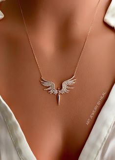 One of the most favorite wings necklaces of our customers, what are you waiting for, wear it too. Silver: 925 sterling silver and gold plated Stone: Cubic zirconia Pendant diameter: 1.57 inches-1.57 inches (4 cm- 3.5 cm) Adjustable length: 2.16 inches (5.5 cm) All the metal components are solid .925 STERLING SILVER (not plated). If you want to see the different color of stone options, please click the link. https://www.etsy.com/listing/926709537 https://www.etsy.com/listing/926714551 I have many Gold Winged Sterling Silver Jewelry, Gold Wing-shaped Sterling Silver Necklace, Sterling Silver Gold Angel Wings Jewelry, Gold Sterling Silver Jewelry With Angel Wings, Wing-shaped Sterling Silver Necklace, Elegant Jewelry Pendant With Angel Wings, Winged Sterling Silver Necklace For Gift, Elegant Sterling Silver Winged Necklace, Angel Winged Jewelry For Gifts