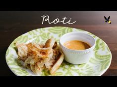 a plate with some food on it and a cup of sauce next to it that says potato pot pie