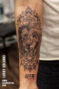 a man with a lion tattoo on his arm