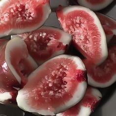 sliced up figs in a bowl on a table