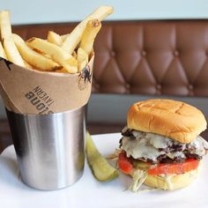 a burger and fries are on a plate