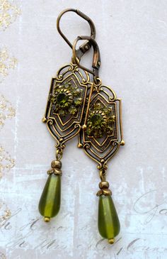 VINTAGE ELEMENTS Unique Jewellery, Handmade from Vintage Inspired Original Designs Art Nouveau, Art Deco, Edwardian, Victorian style Earrings with  Olivine Green Crystals and Frosted Glass Teardrop. These earrings are made with antiqued brass  leverback earwires and measure 6.2cm from the top of the earwires. Filigree Jewelry Vintage, Art Deco Inspired Outfit, Vintage Green Earrings, Green Teardrop Earrings, Vintage Green Jewelry, Art Neauveau Fashion, Vintage Accessories Aesthetic, Art Nouveau Clothing, Green Clothing Aesthetic