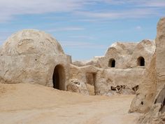 some very strange looking buildings in the desert