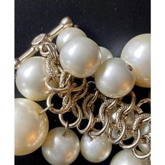 Fun and fab Kenneth Lane bracelet with large Champagne toned faux pearls attached to a pale gold link bracelet. Toggle clasp. Not adjustable — best fits a petite wrist. Circa 1980s. Elegant Chain Bracelet With Toggle Clasp For Formal Occasions, Elegant Formal Chain Bracelet With Toggle Clasp, Elegant Bracelets With Lobster Clasp For Party, Elegant Party Bracelets With Lobster Clasp, Elegant Metal Charm Bracelet For Formal Occasions, Elegant Party Jewelry With Toggle Clasp, Elegant Formal Metal Charm Bracelet, Elegant Gold Charm Bracelet With Clasp, Elegant Metal Chain Bracelet With Clasp