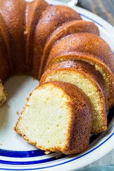 a bundt cake is cut into slices on a plate