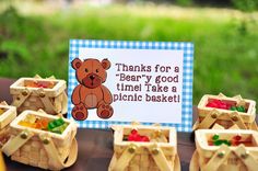 there is a sign that says thanks for a beary good time take a picnic basket