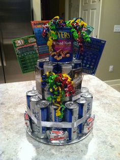 a birthday cake made out of cans and candy