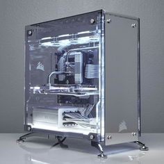 a clear computer case sitting on top of a table