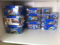 the shelves are filled with legos and plastic containers