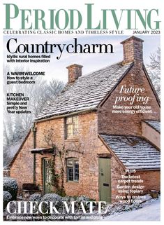 the front cover of period living magazine, featuring an old brick house with snow on it