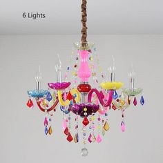 a colorful chandelier hanging from a ceiling