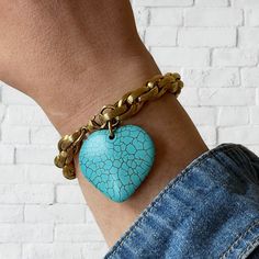 "Turquoise Heart Charm Bracelet This bold bracelet is just the thing your jewelry collection needs. Featuring a turquoise heart this chain bracelet will pull together every look. Not only will this gold bracelet look good on its own, but will make your outlook unforgettable. ★ Complete the look ★ Matching Necklace Available to Purchase Here: https://yourockjewels.etsy.com/listing/1649027172/turquoise-heart-necklace-large-heart ---------------------------------------- M A T E R I A L S * 18K gold Gift Turquoise Metal Bracelets, Trendy Turquoise Metal Bracelets, Vintage Chunky Jewelry Gift, Turquoise Bracelet With Heart Charm For Gifts, Turquoise Bracelets With Heart Charm As Gift, Turquoise Bracelet With Heart Charm As Gift, Turquoise Metal Charm Bracelet As Gift, Turquoise Metal Charm Bracelet Gift, Handmade Turquoise Heart Bracelet