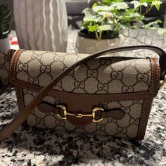 Sorry Not Accepting Offers I’m Taking A Loss By Selling On Pm. Thank You For Looking. New. Worn 2x. Bag Is In New Condition. No Wear. No Damage. Non Smoker. It’s A Beautiful Bag Just A Tad Too Small For Me. Perfect If You Only Carry: Phone, Wallet And Lipstick. Authentic Gucci. Poshmark Will Authenticate! Gucci Horsebit 1955 Mini Bag Style Can Be Worn By Women Or Men. Includes Box, Ribbon And Dust Bag. Box Ribbon, Gucci Horsebit, I Got It, Phone Wallet, Beautiful Bags, Got It, Gucci Bag, Mini Bag, Fashion Bags