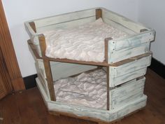 a baby crib that is made out of pallets