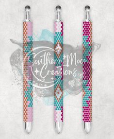 three pens with different designs on them and the words mother creations written in white ink