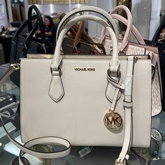 Michael Kors Sheila Medium Center Zip Satchel Crossbody Bag Light Cream Nwt New With The Tag Authentic Details Color: Light Cream Satchel Faux Leather 88.92% Coated Canvas/11.08% Polyester Gold-Tone Hardware 11"W X 8"H X 3.25"D Handle Drop: 4" Interior Details: Back Zip Pocket, 2 Front Slip Pockets Lining: 100% Polyester Zip Fastening Imported Michael Kors Sheila 35s3g6hs2l Lt Cream Md Cz Satchel Non-Lthr Vegan Material Designer White Satchel With Gold-tone Hardware, White Satchel With Gold-tone Hardware, White Shopping Bag With Gold-tone Hardware, Designer White Satchel For Travel, Michael Kors White Shoulder Bag With Branded Hardware, White Michael Kors Shoulder Bag With Branded Hardware, White Tote Satchel With Gold-tone Hardware, White Satchel Tote With Gold-tone Hardware, White Shopping Bags With Gold-tone Hardware