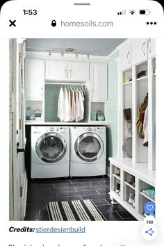 an image of a washer and dryer in a laundry room with clothes hanging on the rack