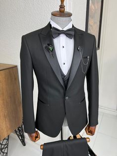 We're featuring a slim-fit dovetail collar black tuxedo.  For spring summer 22" collection.  Tuxedo color: Black  Its fabric includes 80% wool and 20% polyester.  Special details include; a Dovetail collar, double slits, single button and it is fully canvassed.  Your package will include a jacket, vest, pants, shirt, b Designer Tuxedo, Black Suit Vest, Formal Suits Men, Tuxedo Colors, Suit Clothes, Clothes Jacket, Wedding Tuxedo, Pants Gift, Slim Fit Tuxedo