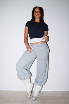 Everyone's favorite jogger sweatpants by Out From Under. Crafted from a so-soft knit in a cozy silhouette with a low-rise and a baggy fit through the legs. Finished with elastic cuffs at the hems. Find them only at Urban Outfitters. Features Out From Under Brenda jogger sweatpant Slouchy lounge pant Super soft knit Low-rise elasticated waistline with drawstring tie Side pockets Cinched elasticated hems Relaxed, slouchy fit Full length Easy pull-on style UO exclusive Content + Care 58% Cotton, 42% polyester Machine wash Imported Size + Fit Model in Black is 5’9" and wearing size Small Measurements taken from size Small Waist: 26" Inseam: 28" | Out From Under Brenda Jogger Sweatpant in Heather Grey, Women's at Urban Outfitters Fashion Joggers, Jogger Sweatpants, Small Waist, Baggy Fits, Lounge Pants, Soft Knits, Jogger Pants, Low Rise, Heather Grey