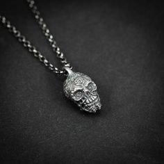 Handmade  Sterling Silver 925 Skull Necklace. The silver necklace was oxidized to create more antique rustic look. It is a unisex necklace so it fits both men and women. DETAILS:  * Material: 925 Sterling Silver * Pendant weight: ~9 Grams. * Dimensions: 0.9 x 0.4 Inch  ❤  Every piece is a unique artwork carefully crafted  by my own hands. Because of this, every piece is unique. So there might be slight variations in shape or color. You can choose different Silver chain length for this pendant or Handmade Silver Necklace With Skull Shape, Skull Shaped Oxidized Jewelry As Gift, Symbolic Skull Jewelry With Oxidized Finish, Oxidized Finish Skull Jewelry For Gifts, Silver Oxidized Skull Necklace, Unique Oxidized Finish Necklaces, Hand Cast Skull Necklace As Gift, Hand Cast Skull Necklace For Gift, Gothic Necklace With Oxidized Finish As Gift