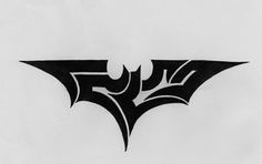 a batman symbol drawn in black ink on white paper with the word's logo below it