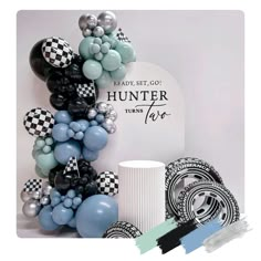 balloons and other items are arranged in the shape of a tower with words that say, ready set go hunter fair