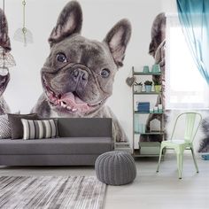 a living room with a couch, chair and wall mural depicting a dog's face