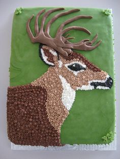 a cake decorated to look like a deer with antlers on it