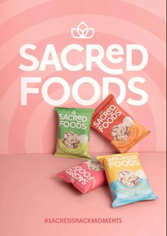 three bags of snacks sitting next to each other on a pink background with the words sacred foods