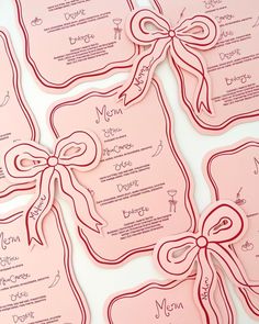 pink wedding menus with bows and ribbons