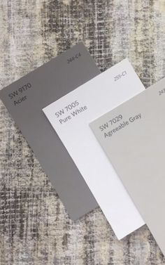 three different shades of gray and white paint on a carpeted surface with the words sw7705 pure white