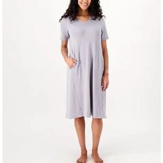 Cuddl Duds Cotton Core V-Neck Dress Sterling Grey,Large. From Cuddl Duds. Features: V-Neckline, Short Sleeves, Inside Patch Pockets, Forward Seams Fit: Semi-Fitted; Follows The Lines Of The Body With Added Wearing Ease Length: Missy Length 40.5" To 42.5"; Plus Length 43" To 44" Content: 57% Cotton/38% Rayon/5% Spandex Care: Machine Wash, Tumble Dry Box,4 Comfortable V-neck Dress For Spring, Comfortable V-neck Relaxed Fit Dress, Comfortable Relaxed Fit Dress With Short Sleeves, Solid Color Relaxed Fit Dresses For Loungewear, Relaxed Fit Solid Color Loungewear Dress, Relaxed Fit Short Sleeve Dress For Loungewear, Relaxed Fit Short Sleeve Loungewear Dress, Comfortable Spring Sleep Dress, Comfortable V-neck Spring Dress