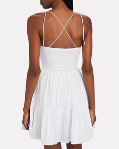 STAUD Landry Ruffled Mini Dress in White | INTERMIX® Chic Mini Dress With Ruched Bodice And Ruffled Straps, Chic Mini Dress With Smocked Back For Daywear, Chic Mini Dress With Smocked Bodice And Ruffled Straps, Chic Sundress With Smocked Bodice For Daywear, Chic Mini Dress With Smocked Bodice For Vacation, Chic Smocked Dress With Adjustable Straps For Beach, Chic Smocked Dress With Ruched Bodice And Spaghetti Straps, Chic Smocked Dress With Ruched Bodice For Vacation, Chic Tiered Mini Dress With Smocked Bodice