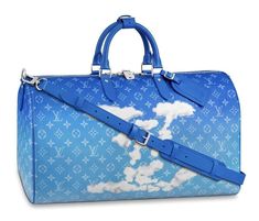 Louis Vuitton Keepall Bandouliere 50 Clouds Blue Monogram Weekend Travel Bag ********** Louis Vuitton ********** Brand: Louis Vuitton Size: 50 (19.7 x 11.4 x 9.1 inches) (Length x Height x Width) Name: Clouds Color: Blue Style: Weekend Travel Bag Style#: M45428 Louis Vuitton's classic Keepall takes to the skies with this dreamlike "Clouds" version by Virgil Abloh for Fall Winter 2020 21 Monogram canvas in gradients of blue is enhanced with oversized LV initials, like skywriting on a sunny day An extra  large capacity and multiple carry options make this a fun and practical cabin size bag  Monogram Clouds coated canvas  Cowhide leather trim  Textile lining  Silver color hardware  Leather handle fastener  Adjustable, removable leather shoulder strap  Zipped closure  Inside zipped pocket  Lea Sac Louis Vuitton, Louis Vuitton Luggage, Replica Louis Vuitton, All Nike Shoes, Green Handbag, Sac Week End, Vintage Luggage, Louis Vuitton Keepall, Vuitton Bag