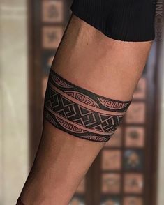 a man with a tattoo on his leg