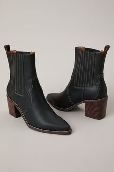 These edgy booties blend classic western style with a modern twist. The PCD side gore panels offer a comfortable, flexible fit, while the western-inspired details add a touch of rugged charm. Fall Chelsea Boots For Rodeo With Round Toe, Fall Boots With Heel Pull Tab And Medium Width, Western Chelsea Boots With Square Toe For Fall, Chelsea Boots With Heel Pull Tab For Fall, Fall Western Chelsea Boots With Square Toe, Fall Western Ankle-high Chelsea Boots, Western Chelsea Ankle Boots For Fall, Western Style Chelsea Ankle Boots For Fall, Western Style Mid-calf Boots With Reinforced Heel For Workwear