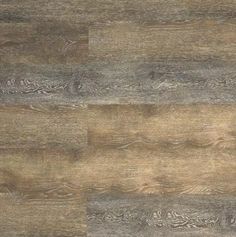 the top view of a wood floor with grey and brown tones, including planks