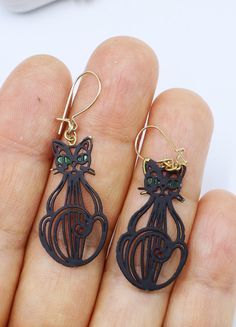 Vintage black metal and gold filled hoop cat earrings, In good vintage condition, It's 42 mm long 15 mm wide. Thanks. Gold Metal Cat Design Earrings, Cute Black Cat Earrings, Metal Cat Design Drop Earrings, Gold Cat Earrings, Black Cat Earrings, Gold Filled Hoops, Cat Earrings, Vintage Black, Black Metal