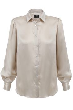 Beige silk shirt with a loose classic cut. The shirt has a classic collar and a sleeve with a delicate puff on the shoulder, cuffs fastened with two buttons made of light mother-of-pearl. The shirt is elegant and feminine, suitable for business meetings and cocktail parties, and also looks great with jeans. In the photo with black cigarillos pants. Size & Fit The blouse is available in two sizes 36/38 and 40/42. Materials 100% Satin silk Wash & Care Dry cleaning or gentle hand washing at 30C Iro Beige Silk, Silk Button Up, Quality Dresses, Satin Shirt, Sustainable Clothing, Silk Shirt, Shirt Women, Silk Satin, Mother Of Pearl