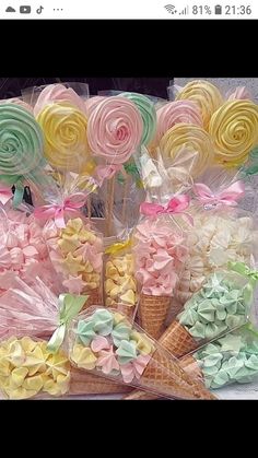 a bunch of lollipops and other sweets on display